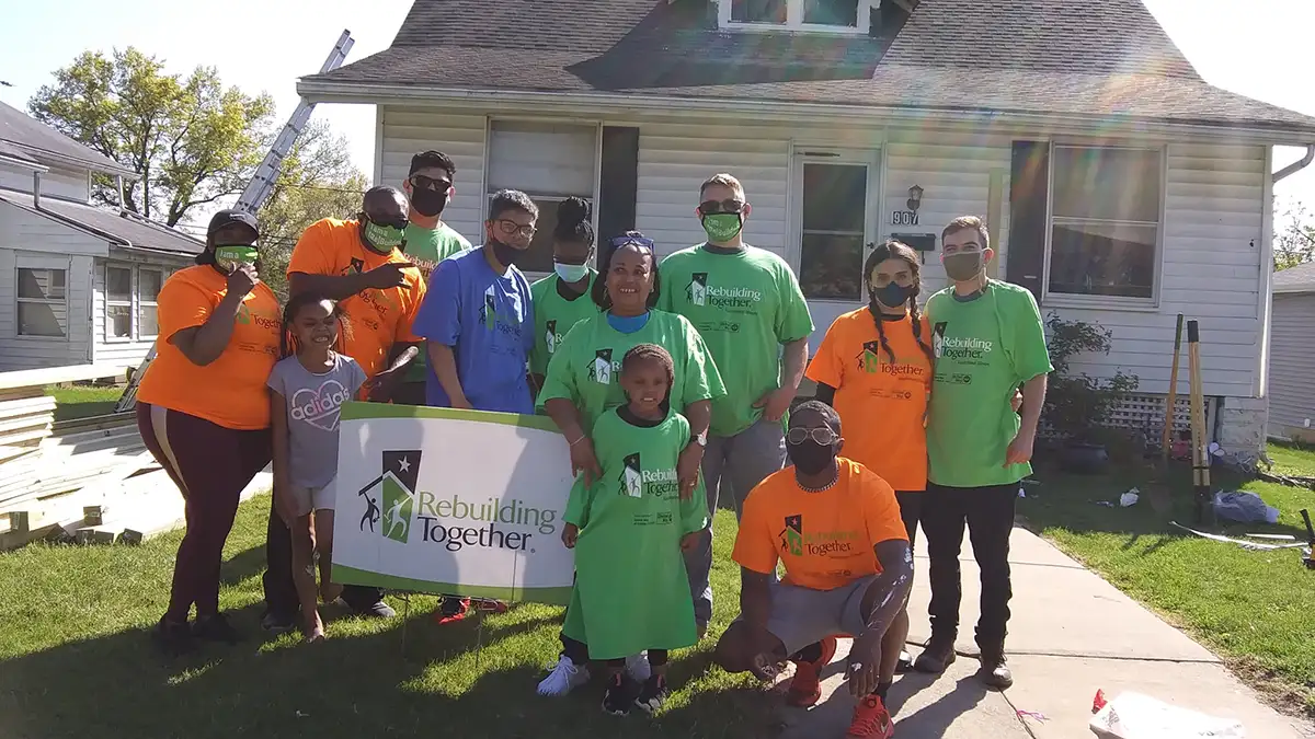 Small group of individuals volunteering with Rebuilding Together Southwest Illinois