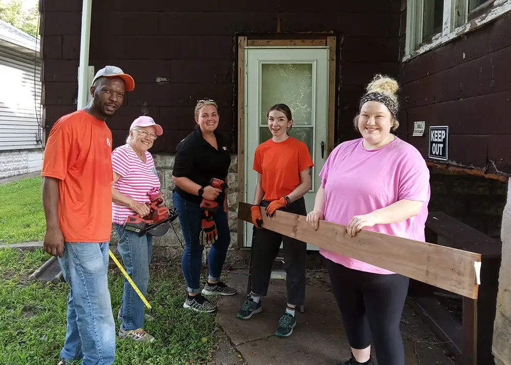 Small group of volunteers working on project, Rebuilding Together SWI past projects - Southwest Illinois